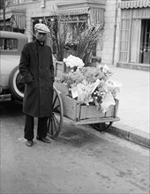 African American man with flower cart