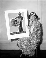Woman holding poster 'Abolish Prohibition!'