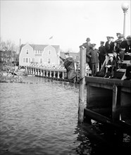 Man jumping off dock