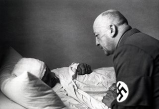 Wounded soldier in hospital after failed assasination attempt on Adolf Hilter