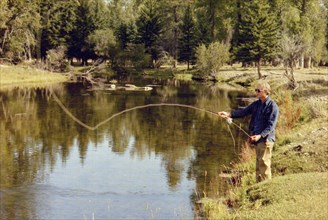 Jimmy Carter fishing in the Grand Tetons WY