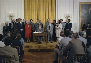 Jimmy Carter signs the Humphrey-Hawkins Bill