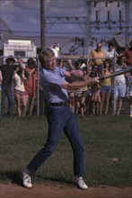 Jimmy Carter at bat during a softball game in Plains GA