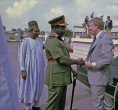 Lt. General Olusegun Obasanjo welcomes Jimmy Carter to Nigeria.