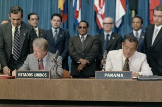 Jimmy Carter and Omar Torrijos signing the Panama Canal Treaty.