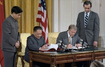 Deng Xiaoping and Jimmy Carter during the Sino-American signing ceremony.