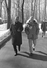 Jimmy Carter and Anwar Sadat walk along Camp David