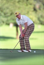 President Reagan playing golf at the Annenberg estate.