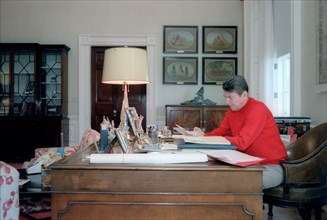 Presidential Photo -  President Reagan working in the residence study.