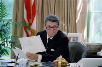 President Reagan wearing glasses.