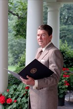 President Reagan reading.