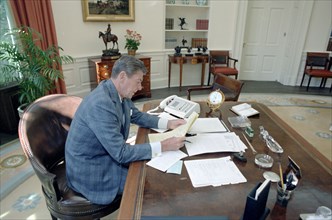 9/24/1981 President Reagan in the Oval Office Working on upcoming speech to the nation.