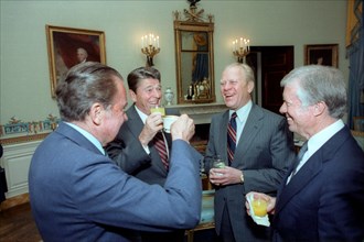Four presidents toasting.