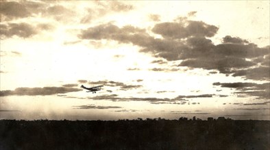 An evening scene: aircraft flying at sunset