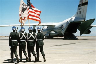 1977 - An Army color guard marches out