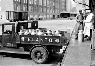 Elannon's milk car and dairy staff
