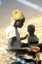Rwandan mother feeding her child