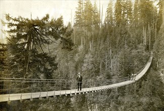 Suspension bridge crossing Capilano River ca. 1919