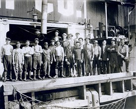 View of fishermen at the New England Fish Company pier