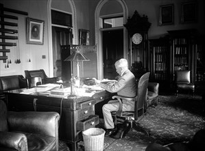 Secretary of State Robert Lansing working at his desk ca. 1910