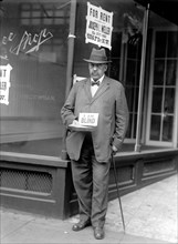 Blind man panhandling for money ca. 1914