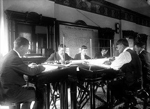 Men working at the United States Weather Bureau ca. 1914