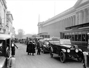 Street scene, Washington monument in background ca. 1913