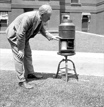 S.P. Ferguson with a machine that measures snow and hail