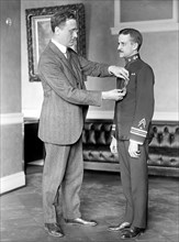 Franklin D. Roosevelt, standing, presenting an award ca. 1916
