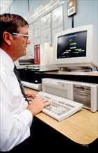Scientist analyzing data on computer screen