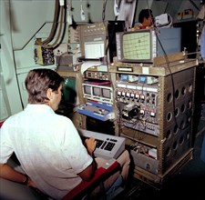 Astronomer at C-141 KAO workstation