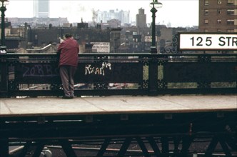 Man standing on 125th Street Elevated Train Platform