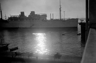 Sunrise over ships passing through the Suez Canal in Egypt ca. between 1934 and 1939