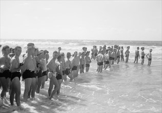 Australian Comforts Fund carnival, men in swim trunks, on Gaza Beach ca. between 1940 and 1946