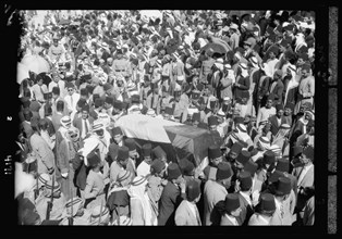 Casket of King Hussein carried in funeral procession ca. 1931