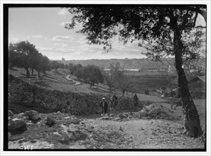 Jerusalem from slopes of Olivet (man and camel coming up the hill) ca. between 1934 and 1939