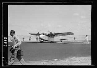 Inauguration of Tel-Aviv landing ground. Palestine Airways. A plane taxing or taxiing] to take position for takeoff ca. 1938