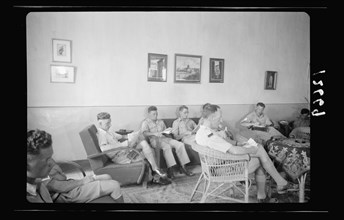YMCA Hostel, interior, lounge, group of troops (likely in Jerusalem) ca. between 1940 and 1946