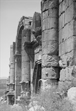 Columns of the triumphal arch at the ruins of Jerash ca. 1900