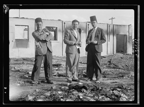 Jacob Simon in Lydda, holding a note pad, interviewing Ethiopian consul ca. between 1934 and 1939