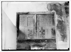 Carved ornaments of the wooden door at the Church of the Nativity ca. 1900