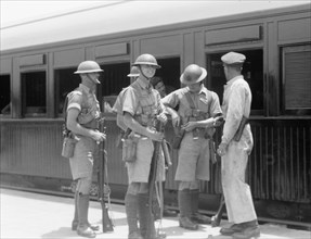 British troops on guard at Lydda Israel train station during the Palestine disturbances of 1936