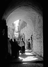 David Street in Jerusalem (Western end, arched street of steps), typical street scene, people walking ca. between 1898 and 1946
