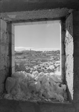 Bethlehem showing Church of Nativity seen through an open window, after a recent snowfall ca. 1941