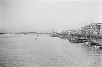 Quay of Port Said in Egypt and landing place where many boats are docked ca. 1900