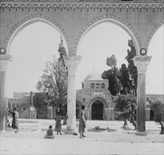 Men standing outside Mosque of el-Aksa [i.e., al-Aqsa] ca. between 1934 and 1939