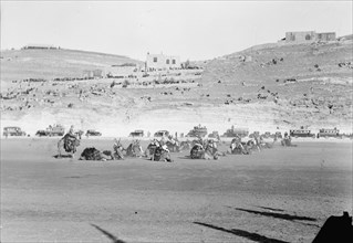 Prince Emir Saud's visit to Emir Abdullah in Amman, Transjordan. Camel Corps of Arab Legion, camel drill ca. 1935