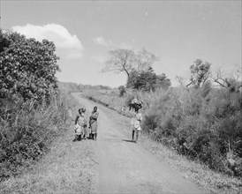 Uganda women on the road to Fort Portal ca. 1936