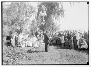Scots Mission Hospital, Tiberias. Morning church service to a gathering of out-patients (Rev. Abdullah) ca. between 1934 and 1939