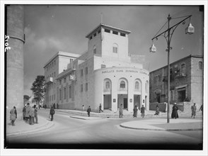 Newer Jerusalem and suburbs street scene. New municipal building occupied by Barclay's Bank and the municipality ca. 1932
